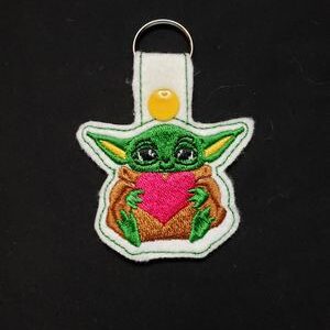 Yoda Holding Heart